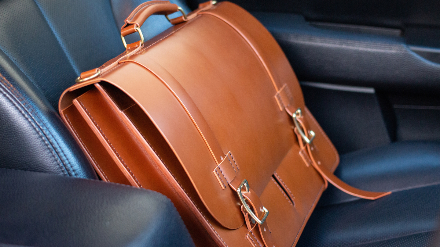 A briefcase on a car seat, ready for an attorney’s house call