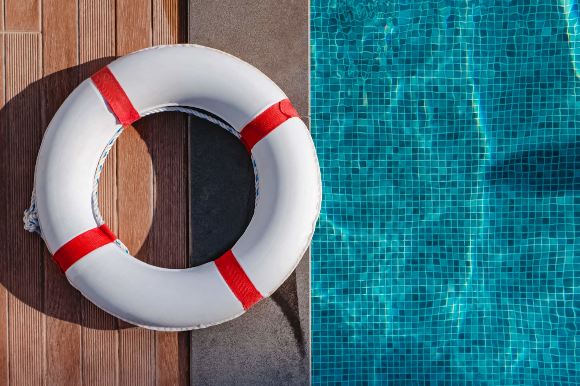 A life preserver beside a pool, representing help when a property dispute arises